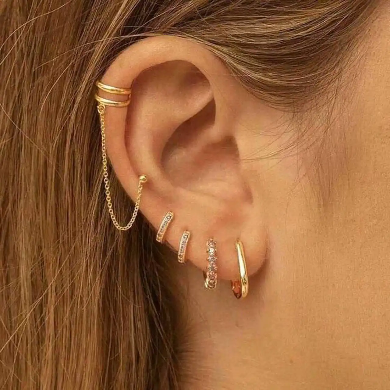 مدل گوشواره بخیه ای طلا + زیباترین مدل های گوشواره بخیه ای طلا ترند امسال